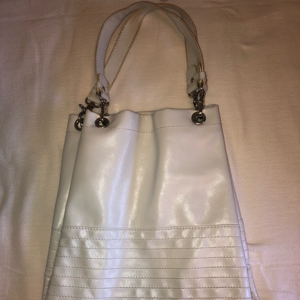 Both White and yellow Aldo purses